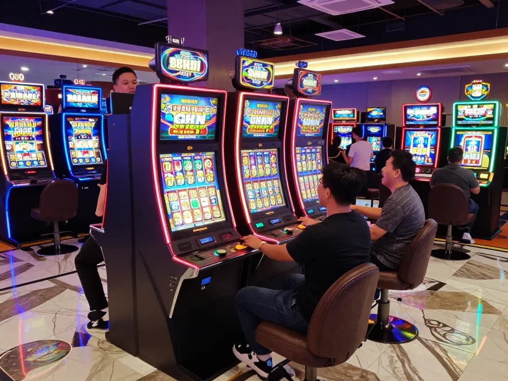 Players engaging with vibrant slot gacor machines, celebrating wins and excitement on the casino floor.